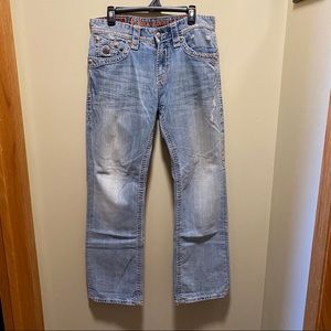 Rock revival light washed men’s jeans